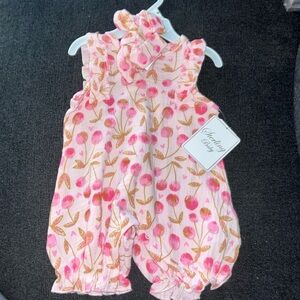 Cherry printed pink romper by Sterling Baby. 6 month. NWT.
